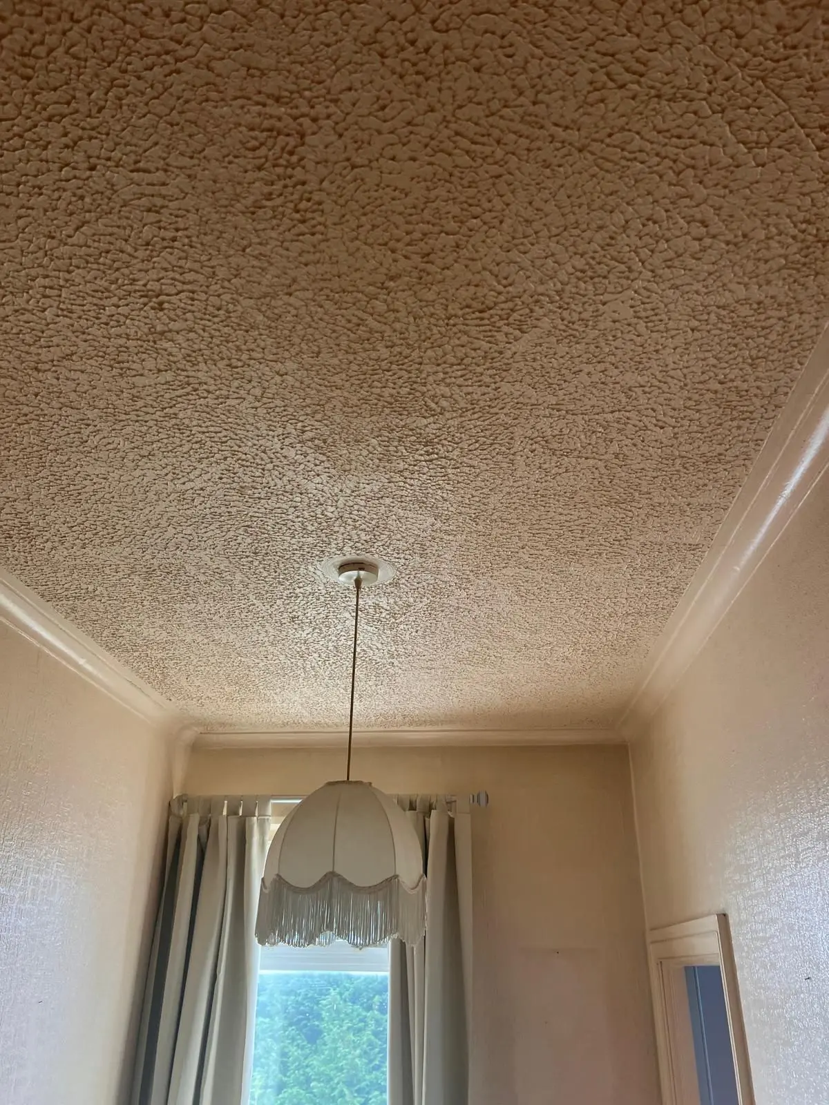 Artex textured ceiling before asbestos removal work in London