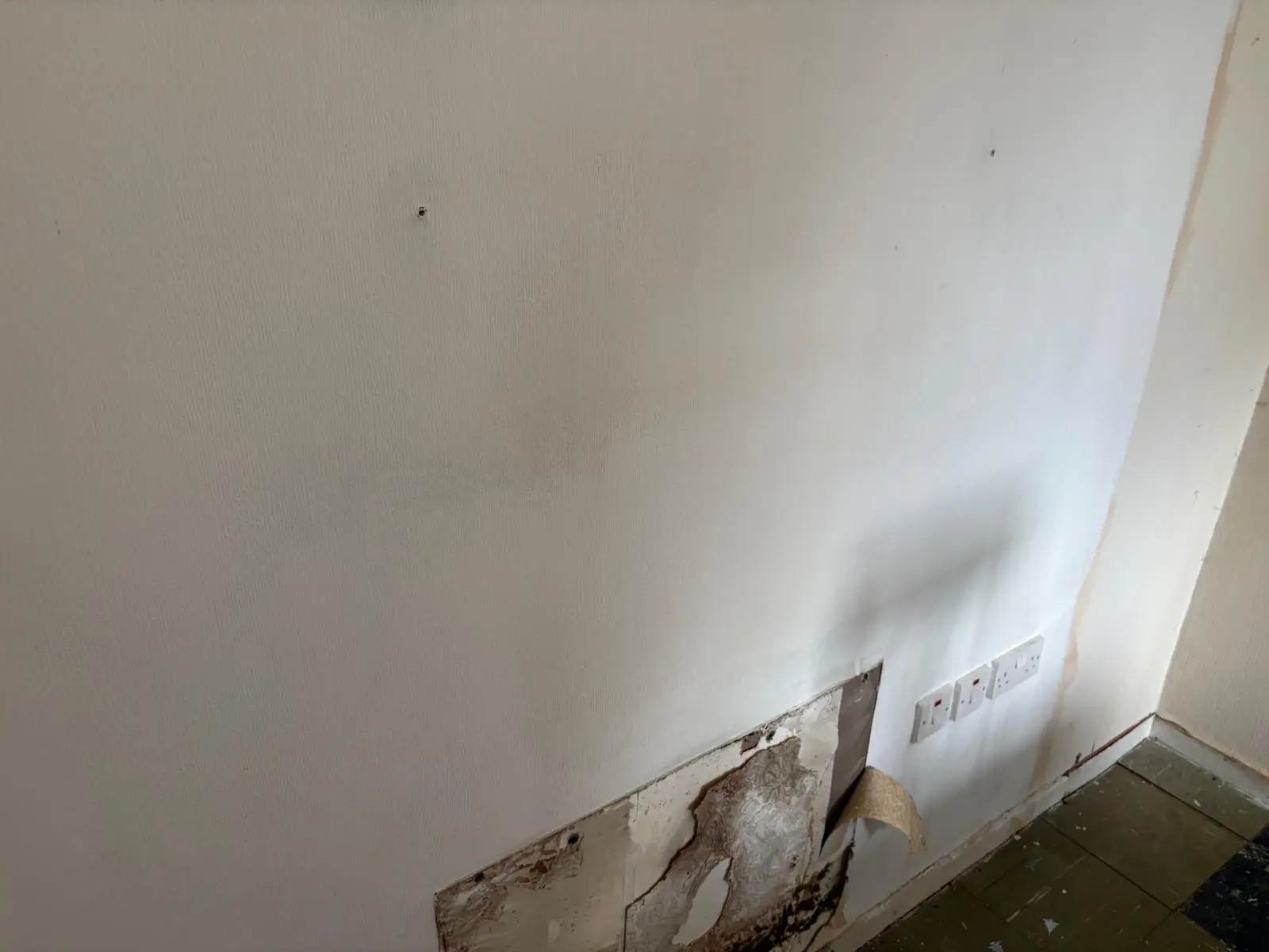 Textured wall coating prepared for asbestos Artex wall removal in London