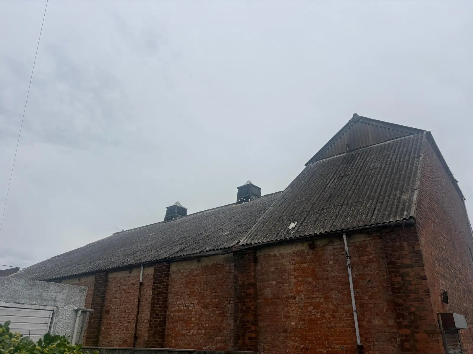 Large corrugated asbestos cement roof on a commercial building