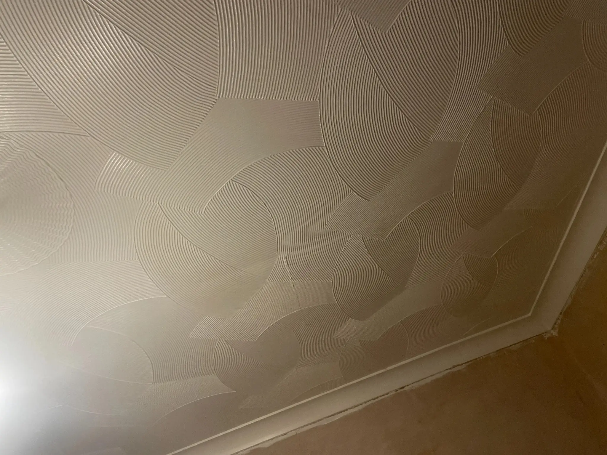 Asbestos Artex removal London — textured ceiling in a London property before asbestos assessment or removal