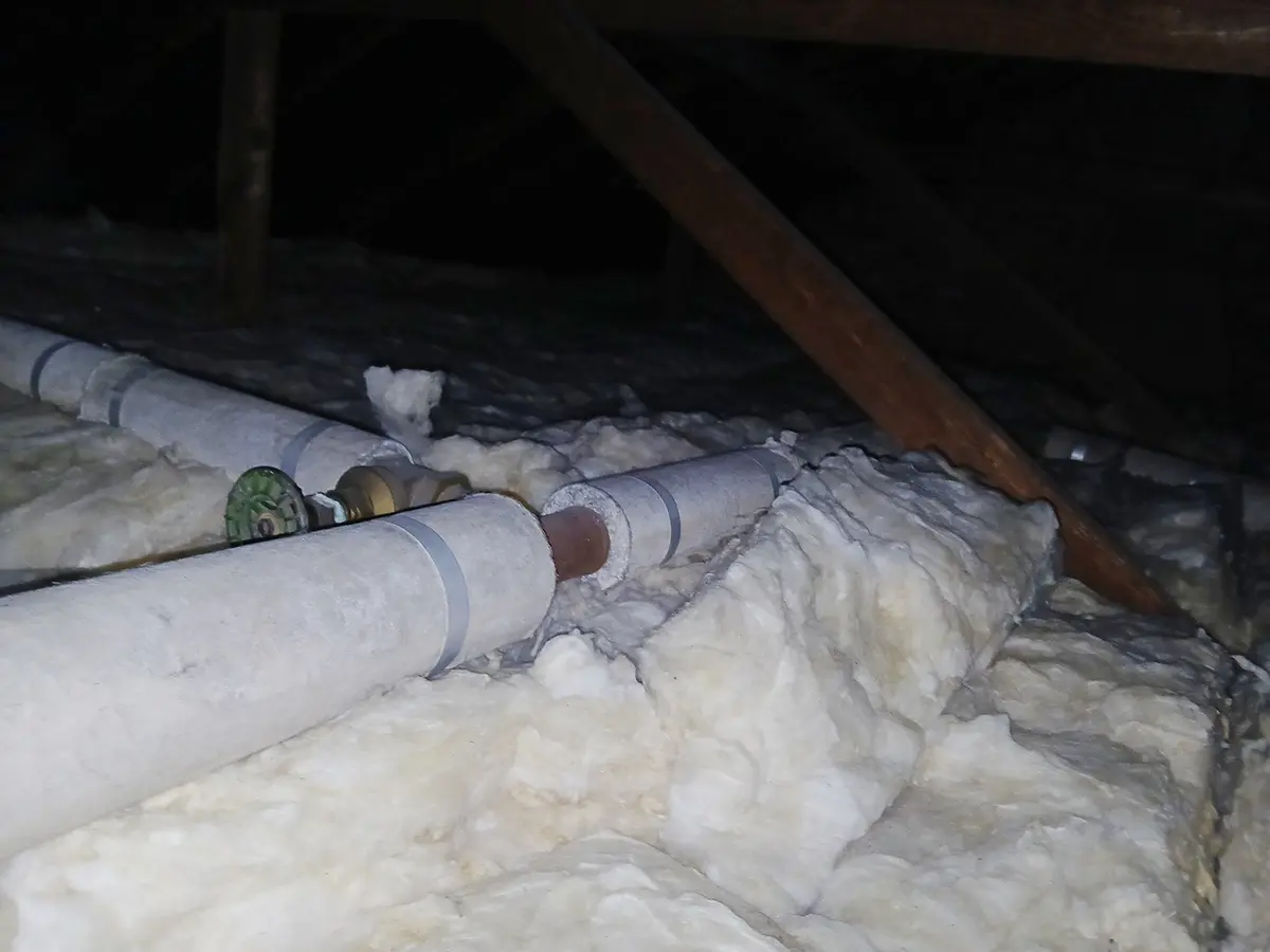 Insulated loft pipework for asbestos pipe insulation assessment London, Hampstead NW3