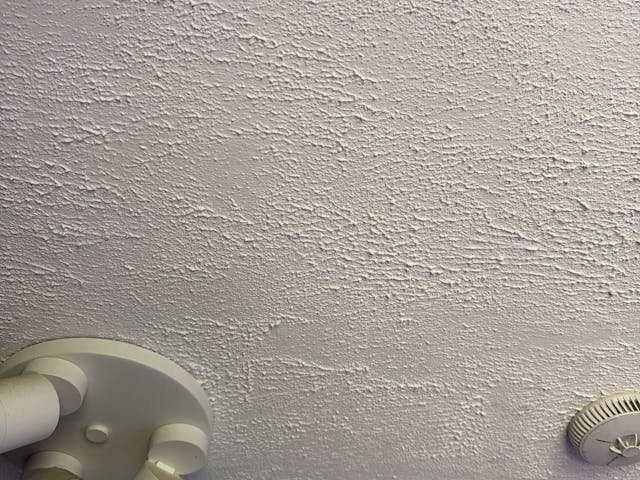 Textured ceiling coating recorded during an asbestos survey in London