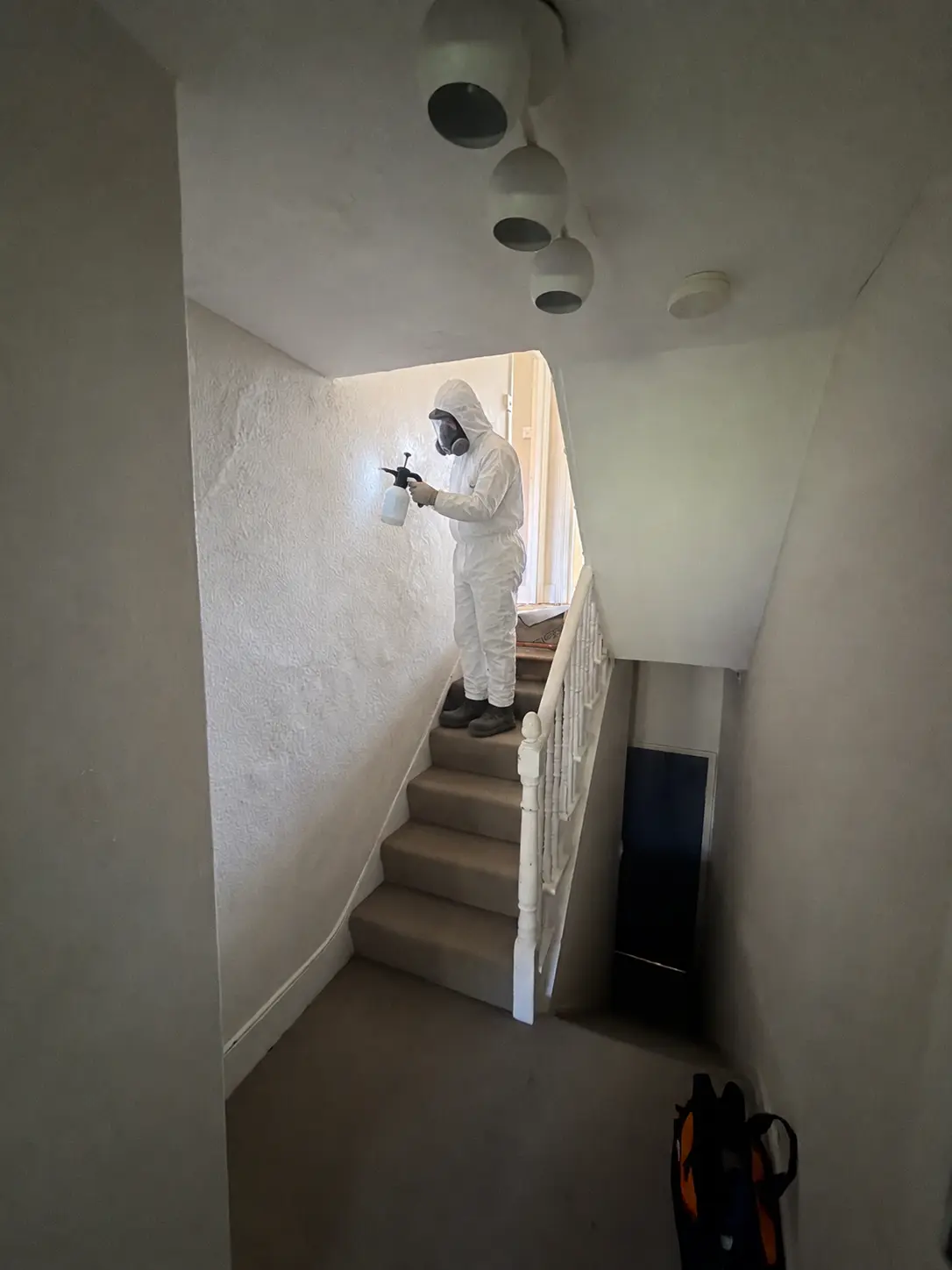 Asbestos textured coating removal Muswell Hill - Rosebery Road (N10) N10; stairwell ceiling with opened sections